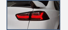Load image into Gallery viewer, FARI POSTERIORI MITSUBISHI LANCER/EVO 10 X 2008-2017 Smoked Lens