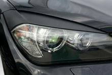 Palpebre fari BMW X1 E84 (2009-2015)