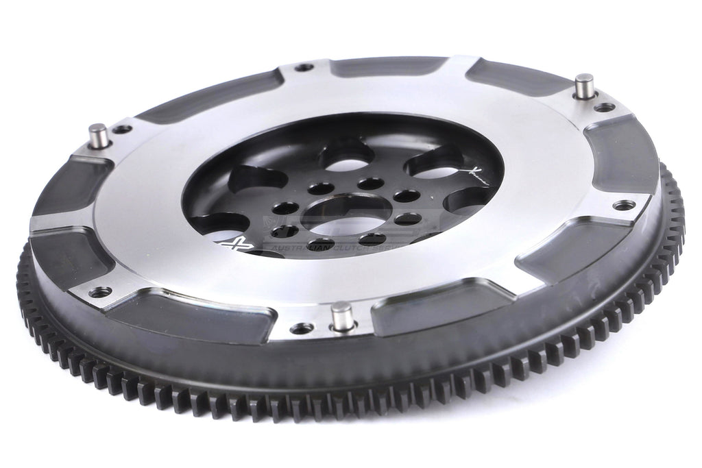 Volano Xtreme Clutch acciaio cromo-molibdeno - peso di spedizione 5.1 kg - Toyota Celica MK4 MK5 AA63 AT160 1983-1989 / Toyota Corolla E8 AE86 AE82 1983-1987 / Toyota Sprinter AE82 AE86 1983-1987