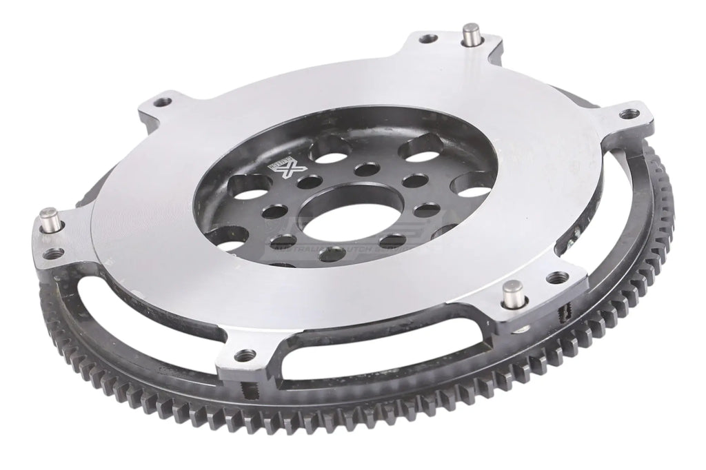 Volano Xtreme Clutch alleggerito acciaio cromo-molibdeno - peso di spedizione 4.1 kg - Lotus 2 Eleven 2007-2011 / Lotus Elise MK2 2002-2013 / Lotus Exige MK1 MK2 MK3 2001-2012 / Toyota Celica MK6 MK7 1999-2005 (+1 modelli)
