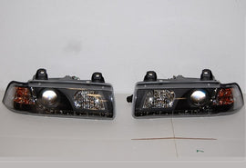 Fari Anteriore Day Light BMW E36 '92 4P. Black BMW E36