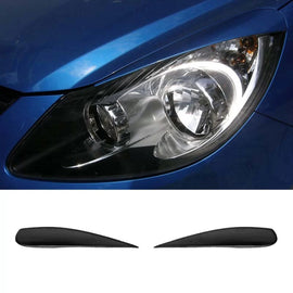 Palpebre fari per Opel Corsa D 06-14 2 pezzi