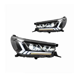 Set fari anteriori per Toyota Hilux Revo 15-19 con dinamico Start DRL & segnale nero con motorino VLand