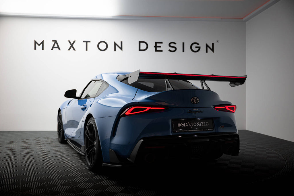 Alettone Toyota Supra Mk5 in Fibra di Carbonio + LED (con attacco swan neck superiore) — dettaglio del fissaggio