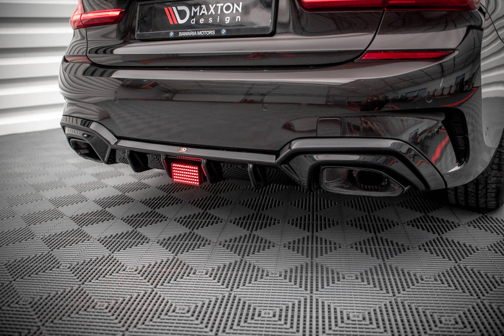 Vista posteriore della BMW Serie 3 G20 M-Pack con luce di stop a LED