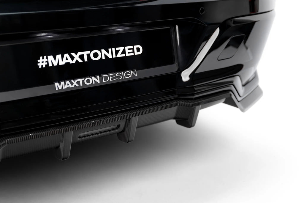 Splitter Posteriore Centrale BMW Serie 7 G70 750e xDrive M-Pack / 740d xDrive M-Pack / I7 eDrive50 xDrive M-Pack — vista angolata