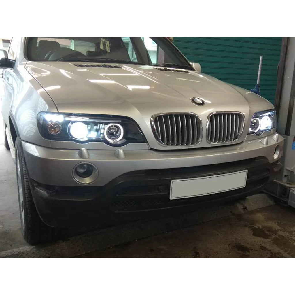 Kit fari anteriori con lampade alogene Angel Eyes per BMW X5 E53 09.1999-10.2003, sinistro e destro tuning