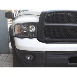 Set fari anteriori con lampade alogene Angel Eyes per Dodge RAM 2002-2006, sinistro e destro tuning