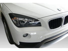Palpebre fari BMW X1 E84 (2009-2015)