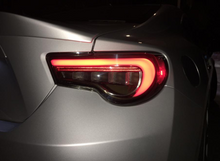 Load image into Gallery viewer, Fari Posteriori VALENTI REVO JEWEL LED TAIL LAMP Freccia sequenziale GT-86/BRZ/FR-S 12+ (Light Smoke Lens / Black Chrome) - em-power.it