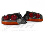 Mitsubishi Lancer Evo VIIVIII/IX 02/- Fanali Posteriori Mitsubishi Lancer Evo OE style Gunmetal