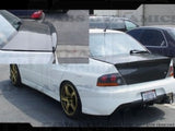 Mitsubishi Lancer Evo VIII 02/- Estensione spoiler Portellone in Carbonio