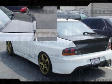 Mitsubishi Lancer Evo VIII 02/- Estensione spoiler Portellone in Carbonio